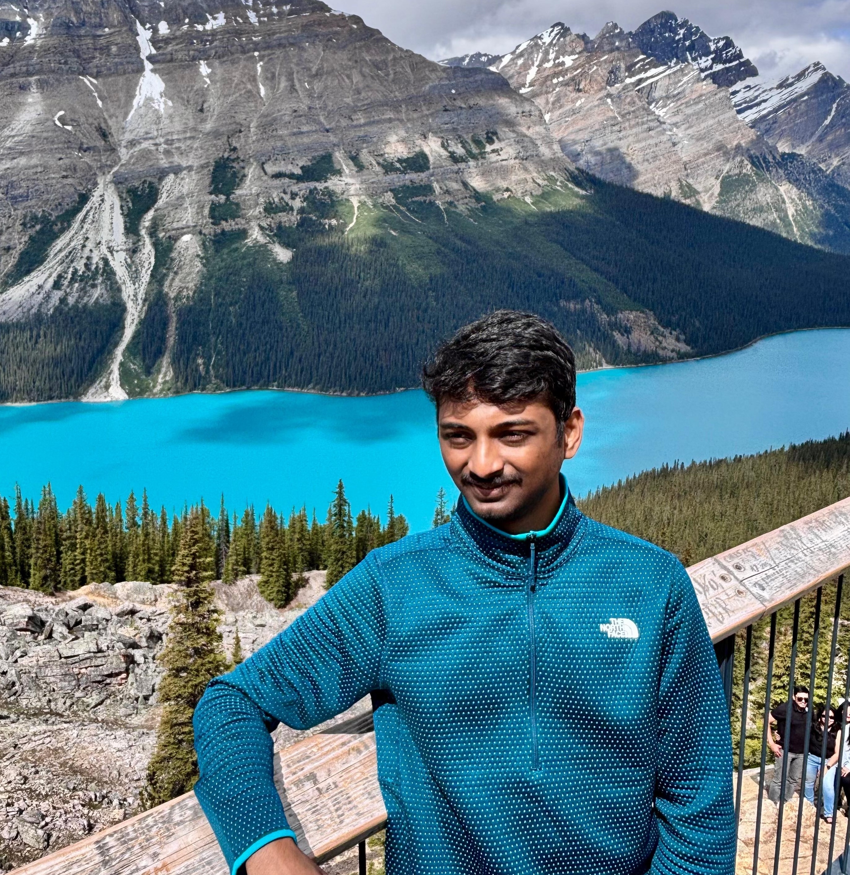 Prashant Govindarajan has brown skin, black eyes, and short black hair.